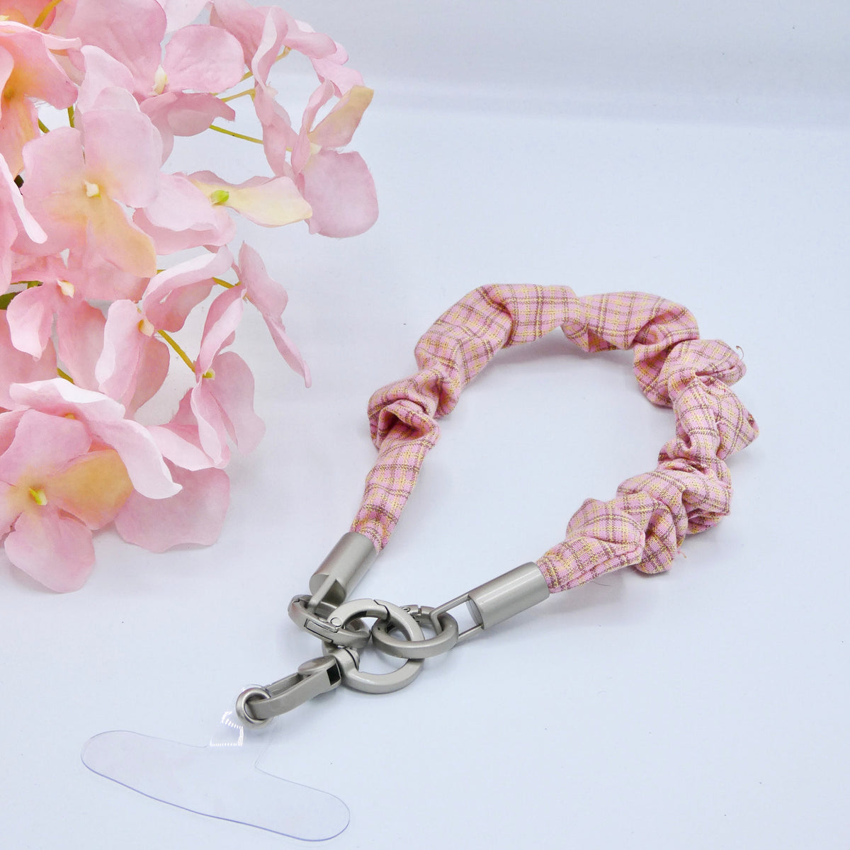 Cuelga móvil de mano rosa
